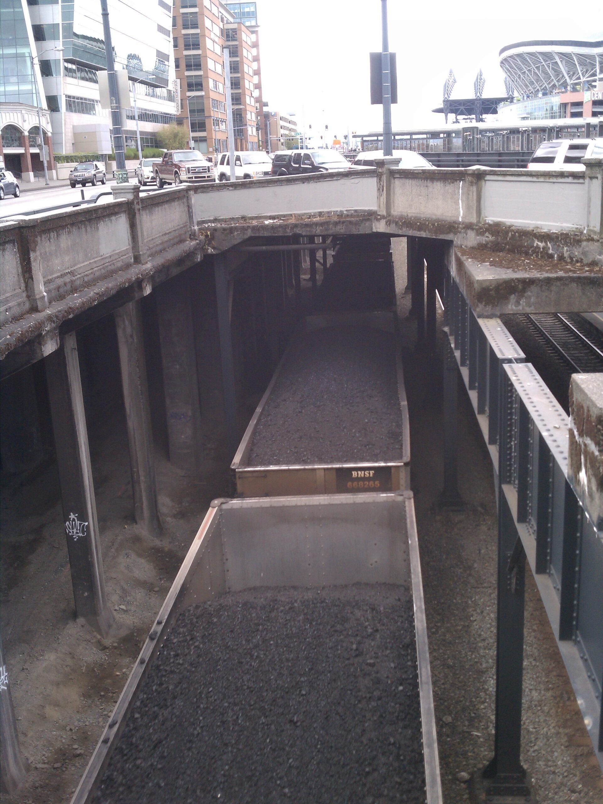 Coal train passing through downtown Seattle.