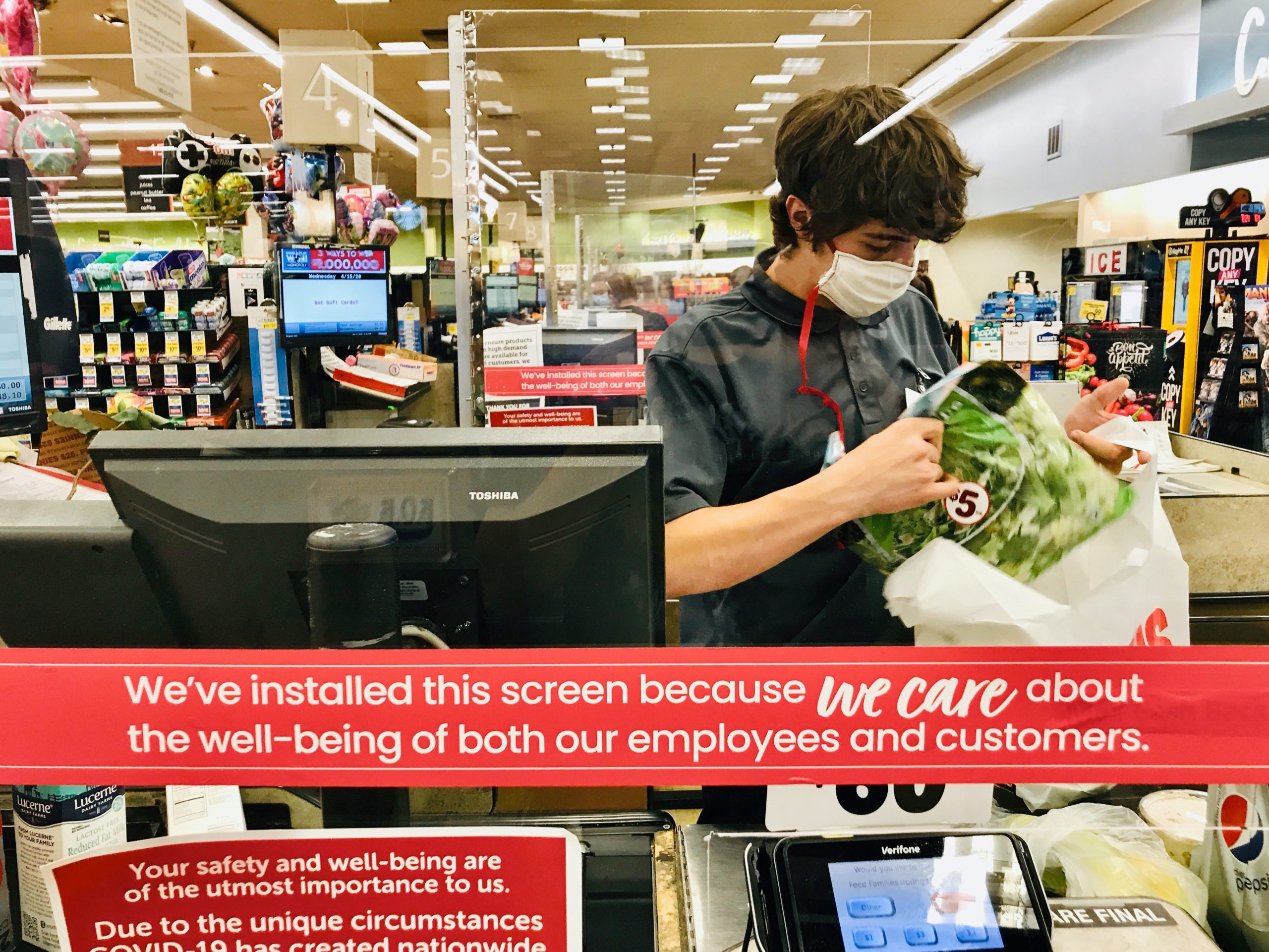 Grocery store checker, on the frontlines of the coronavirus pandemic.