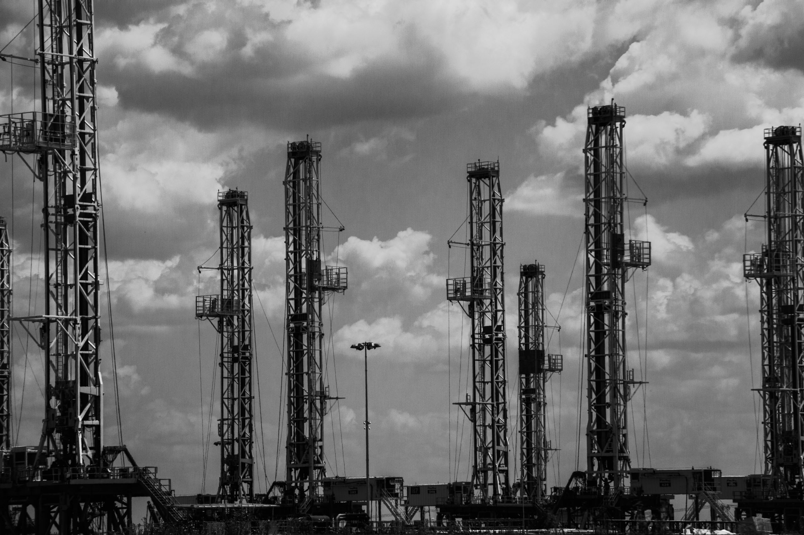 Oil wells, west Texas. Without fossil fuel risk bonding, polluters can shift the clean up costs to the public.