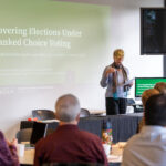 University of Oregon SOJC Portland — Panel discussion organized by the Agora Journalism Center about media coverage of ranked choice voting, in the Papé Forum Saturday June 15, 2024. Portland journalists and elections officials meet with journalists from around the country who have experienced covering ranked choice elections. Photo by Fred Joe