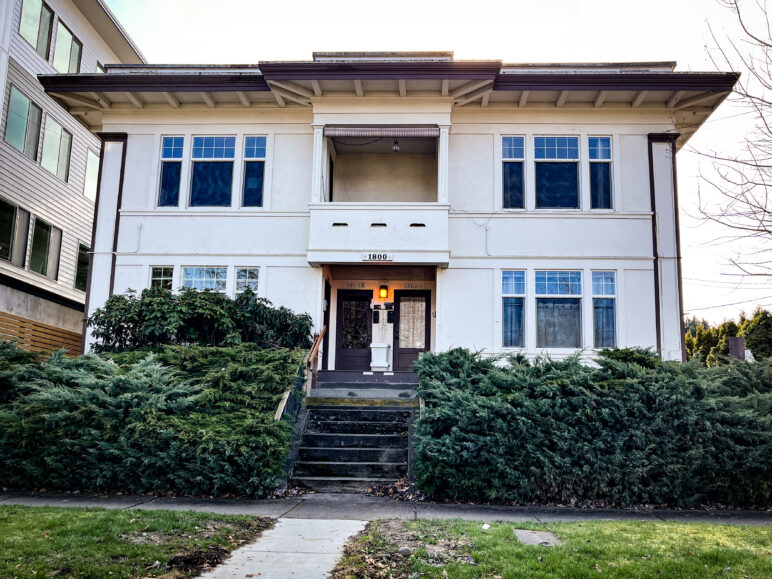 This 1914 fourplex in Bellingham was built prior to the adoption of parking mandates. With only one parking space in the rear, it would be illegal to build today.